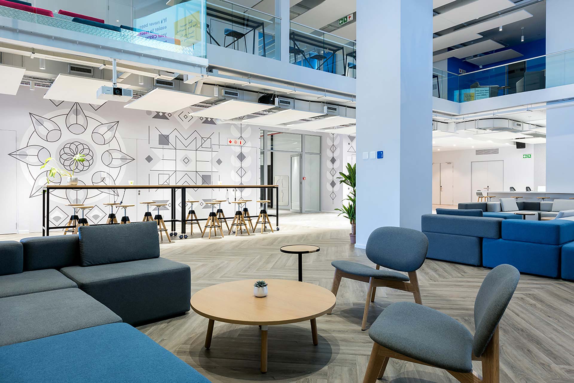 Main reception area with chairs and tables in 2U office in Cape Town
