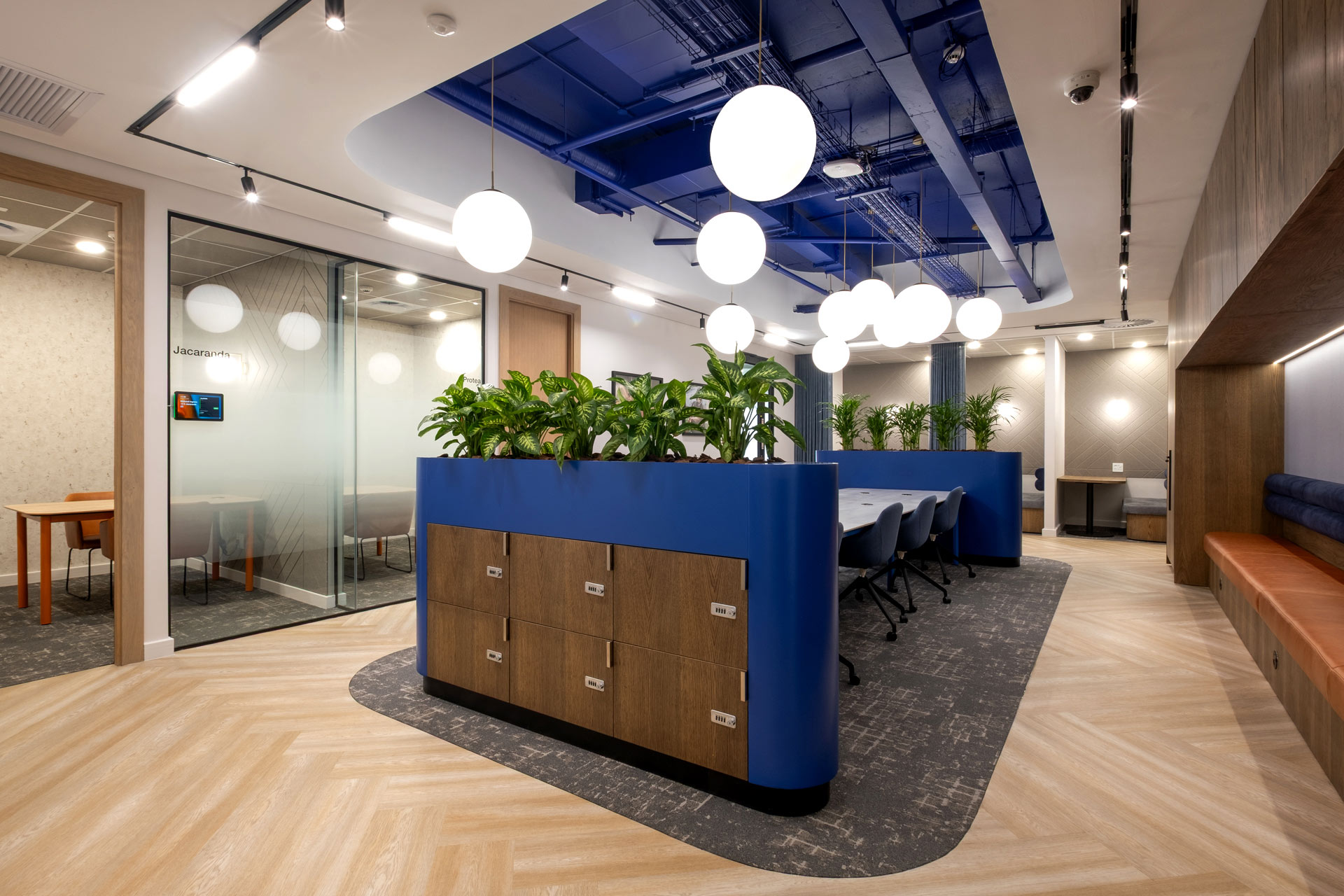 BASF open-plan workstations with sphere hanging lights