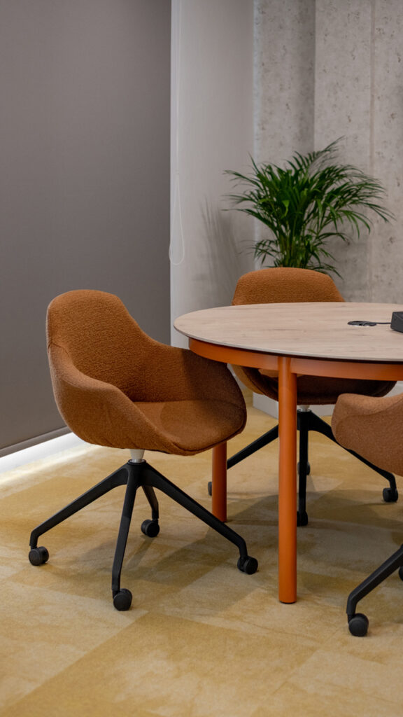 Workstations with desks and chairs in BASF workspace