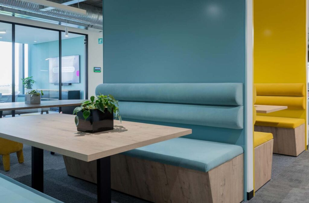 Colourful booth seating in Impact office in Cape Town