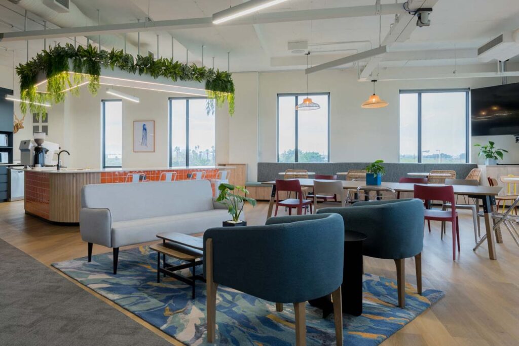 Informal lounge with armchairs in Impact office in Cape Town