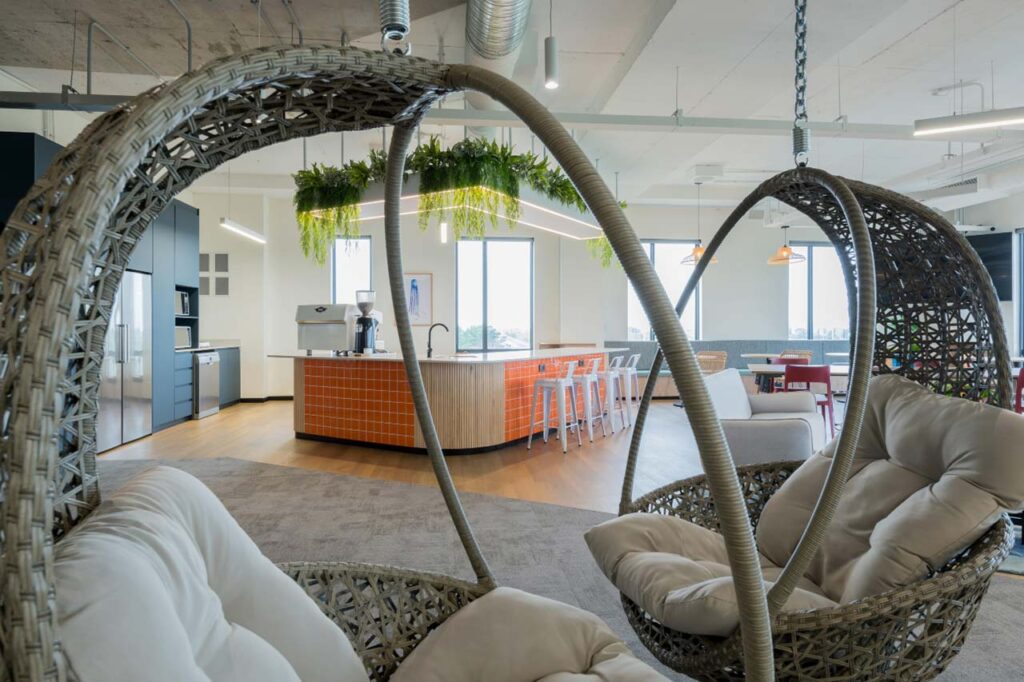 Relaxed seating area with pod chairs in Impact office in Cape Town