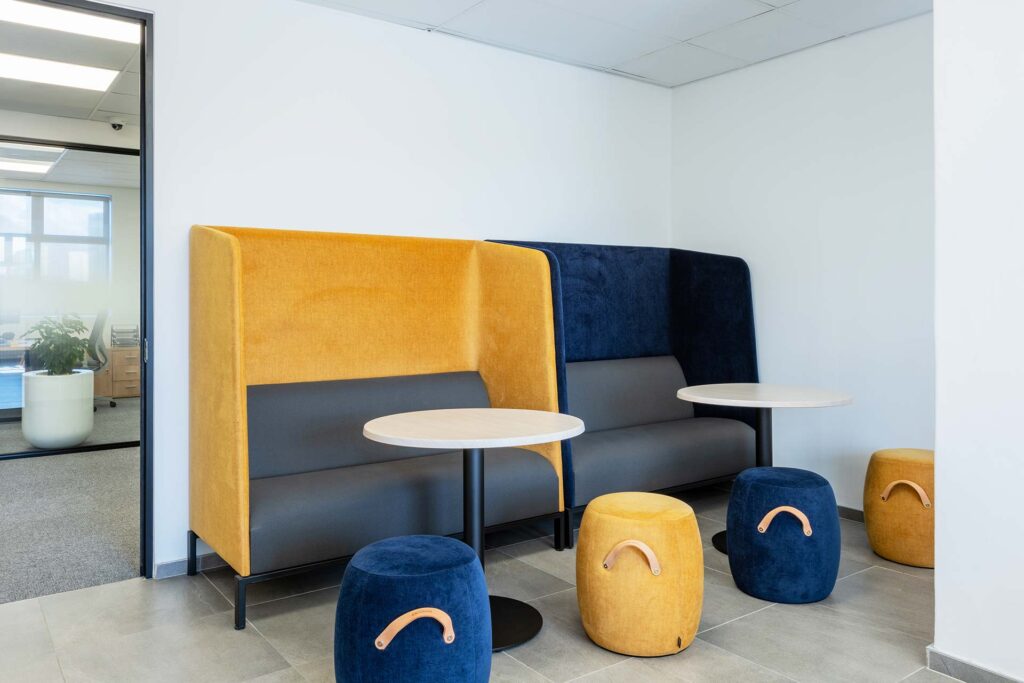 Booth seating with ottomans in Mianzo office in Cape Town