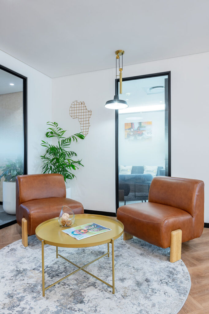 Client lounge area with leather couches in Mianzo office in Cape Town