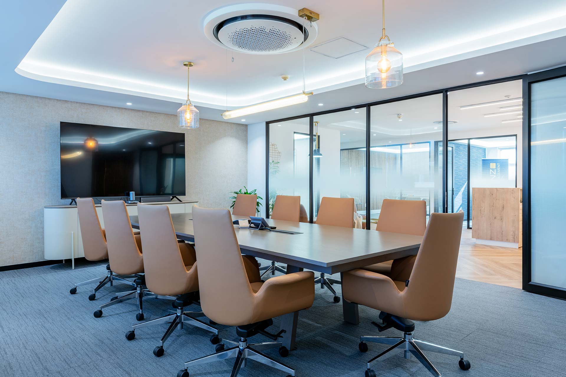Boardroom with long table, TV and furniture procurement in Mianzo office in Cape Town