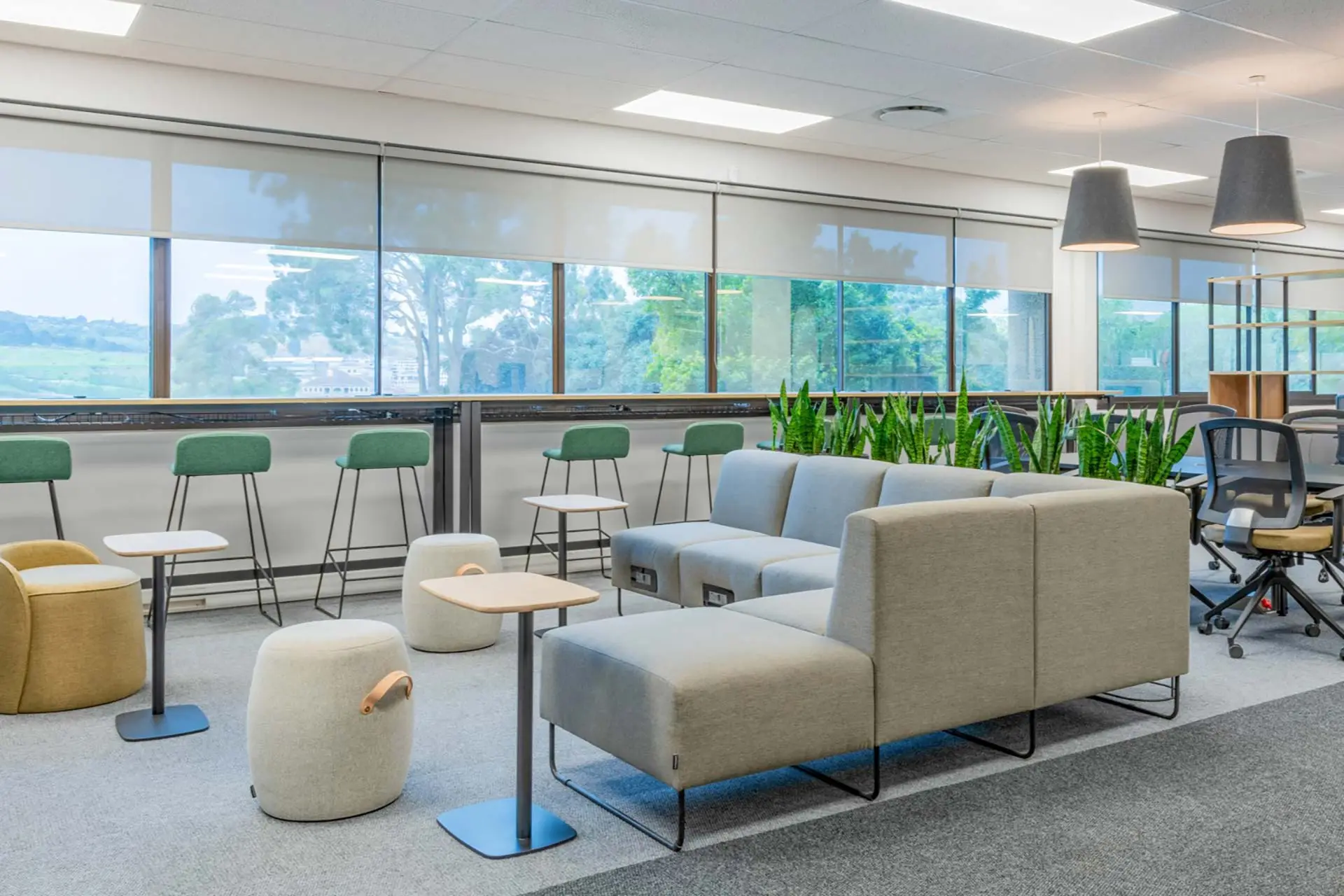 Couch with laptop tables and ottomans for PepsiCo in Cape Town