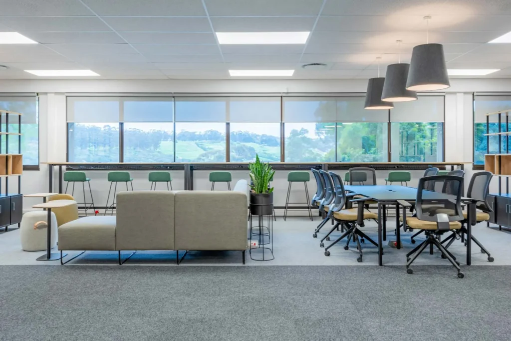 Meeting tables with ergonomic chairs in open plan office for PepsiCo in Cape Town