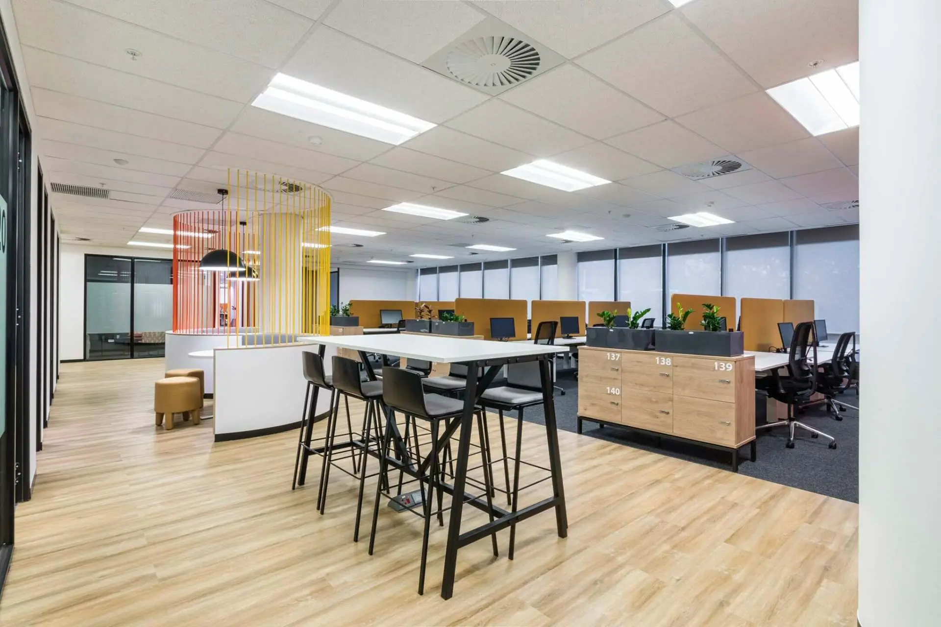 Workstations with bar stools and varied seating for PepsiCo office furniture in Cape Town