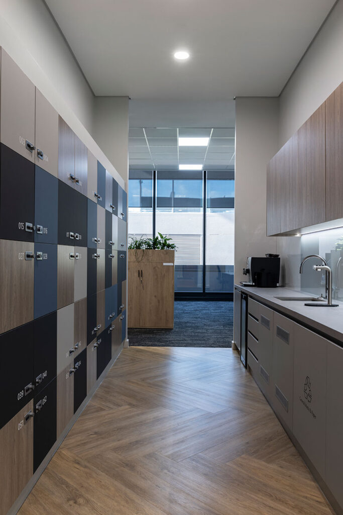 Office lockers and kitchenette in Pinsent Masons workspace in Rosebank