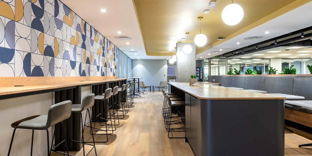 Canteen with bar stools, pendant lighting and wallpaper design for PPS in Cape Town