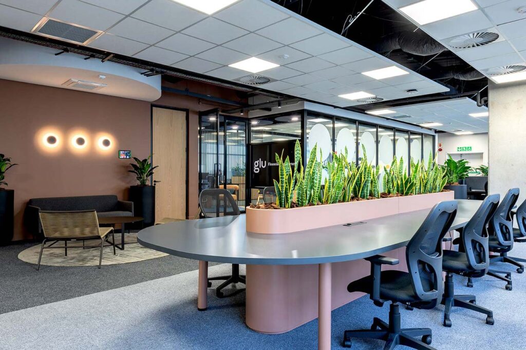 Workstations with planters and ergonomic seating for PPS office in Cape Town
