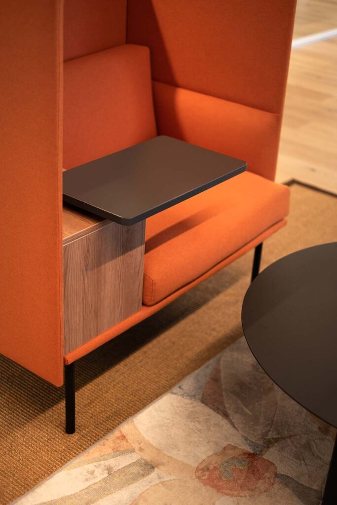 Booth seating with laptop tables for audio streaming client in Cape Town