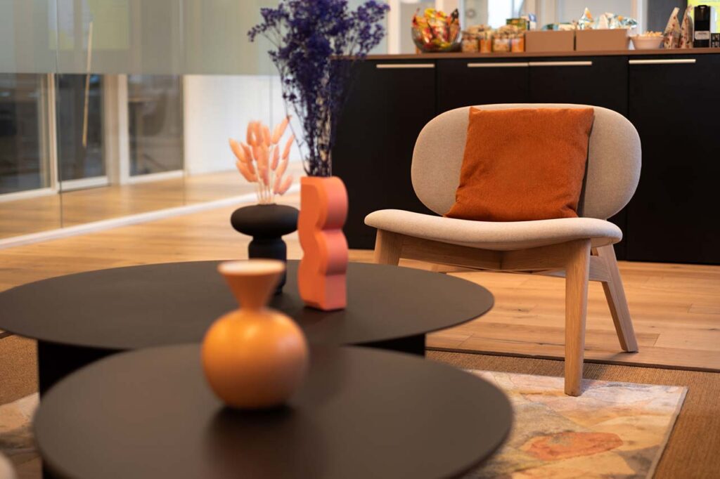 Informal seating area with soft furnishings for audio streaming client in Cape Town