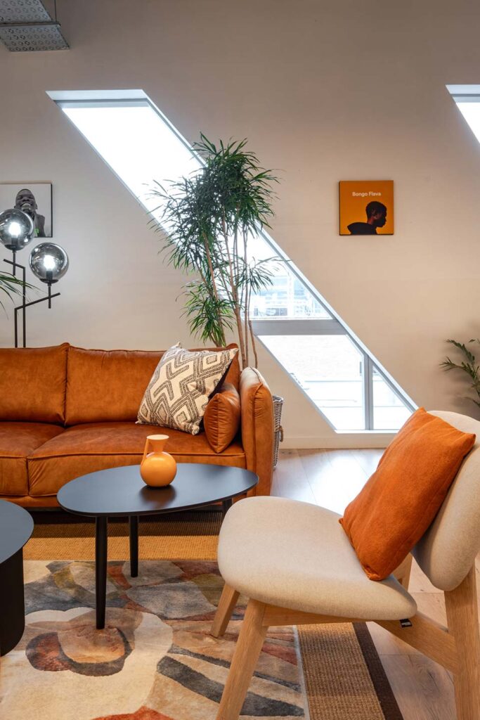 Informal lounge with colourful seating for audio streaming client in Cape Town