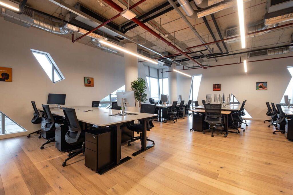 Open plan workstation with collaborative space for audio streaming client in Cape Town