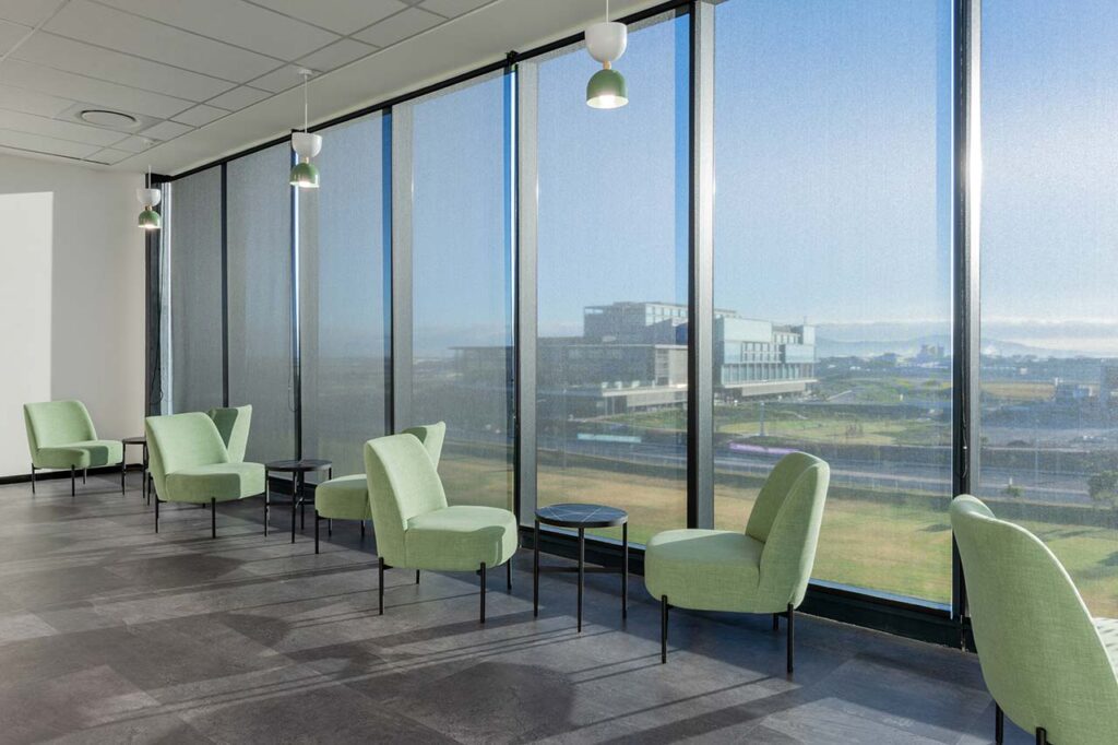 Reception area with mint green finishes for private call centre office in Cape Town