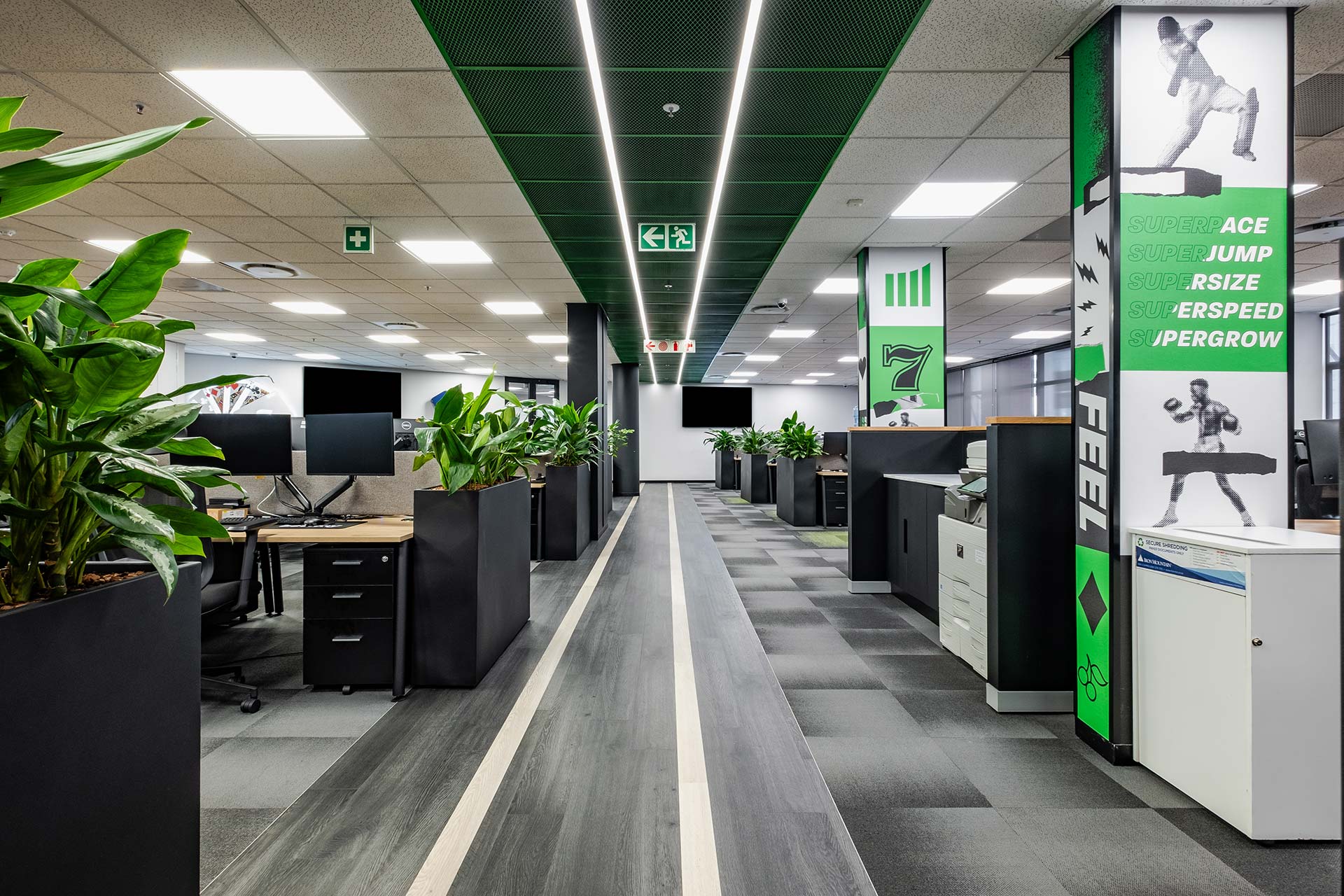 Open plan office with workstations for private digital services client in Johannesburg