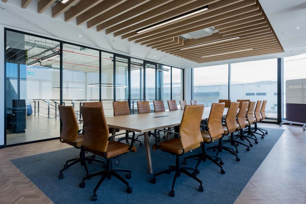 Boardroom with table and ergonomic chairs in Rubicon office in Cape Town