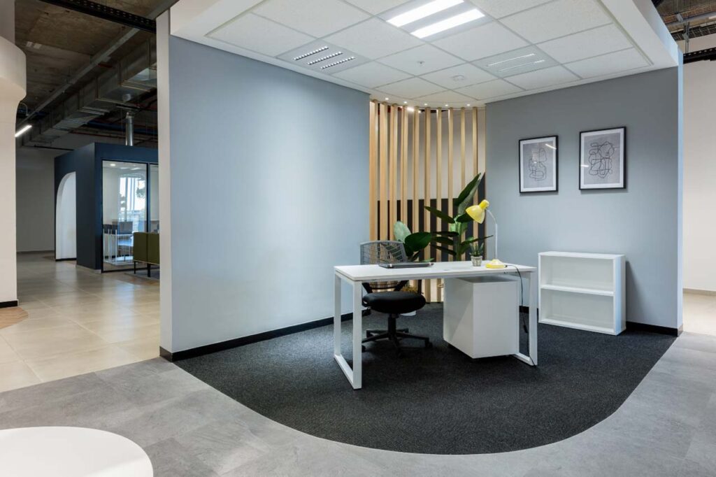 Showroom area with open plan office furniture and shelving in Rubicon Group office in Cape Town