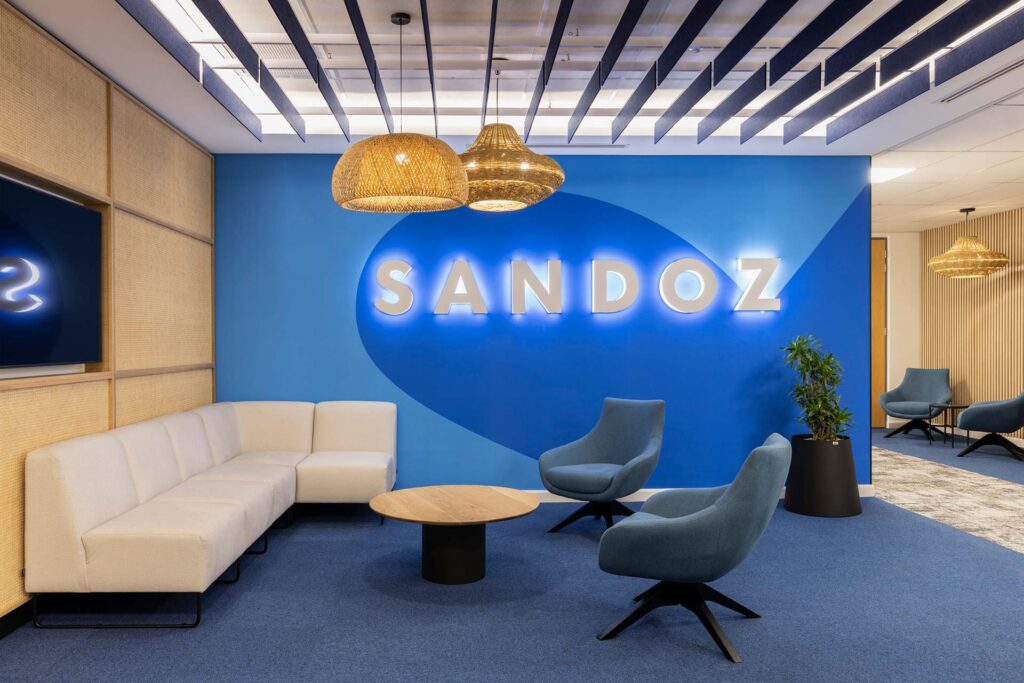 Breakaway informal meeting area with Sandoz logo on wall in Sandoz office in Johannesburg