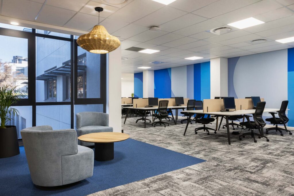 Open-plan workstations with ergonomic seating in Sandoz office in Johannesburg