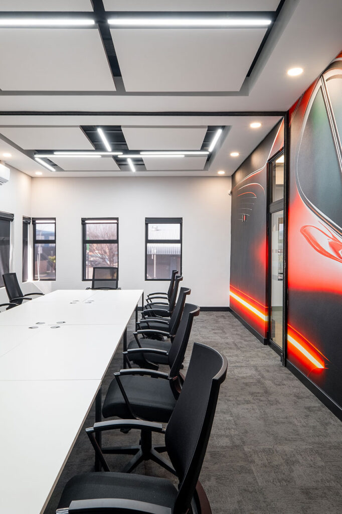 Shield Chemicals boardroom with ergonomic chairs and linear LED lighting Johannesburg