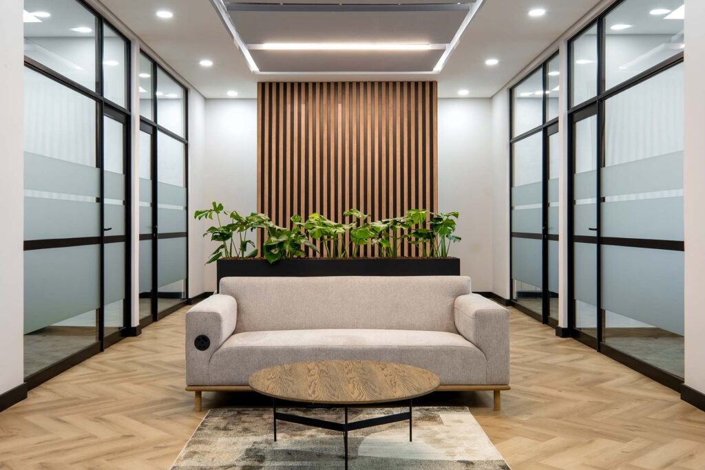 Sofa seating area with corporate furniture in Shield Chemicals office in Johannesburg