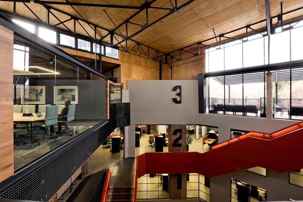 Open plan atrium with meeting rooms and workspaces for Thungela in Johannesburg