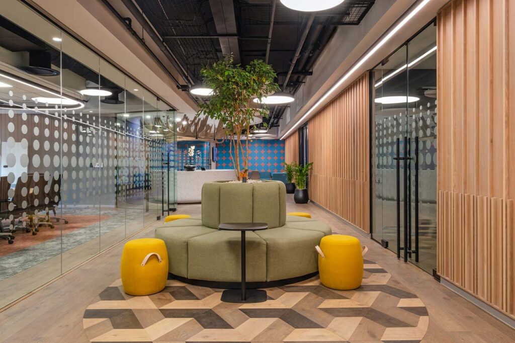 Commercial office reception area with couches and ottomans in Johannesburg