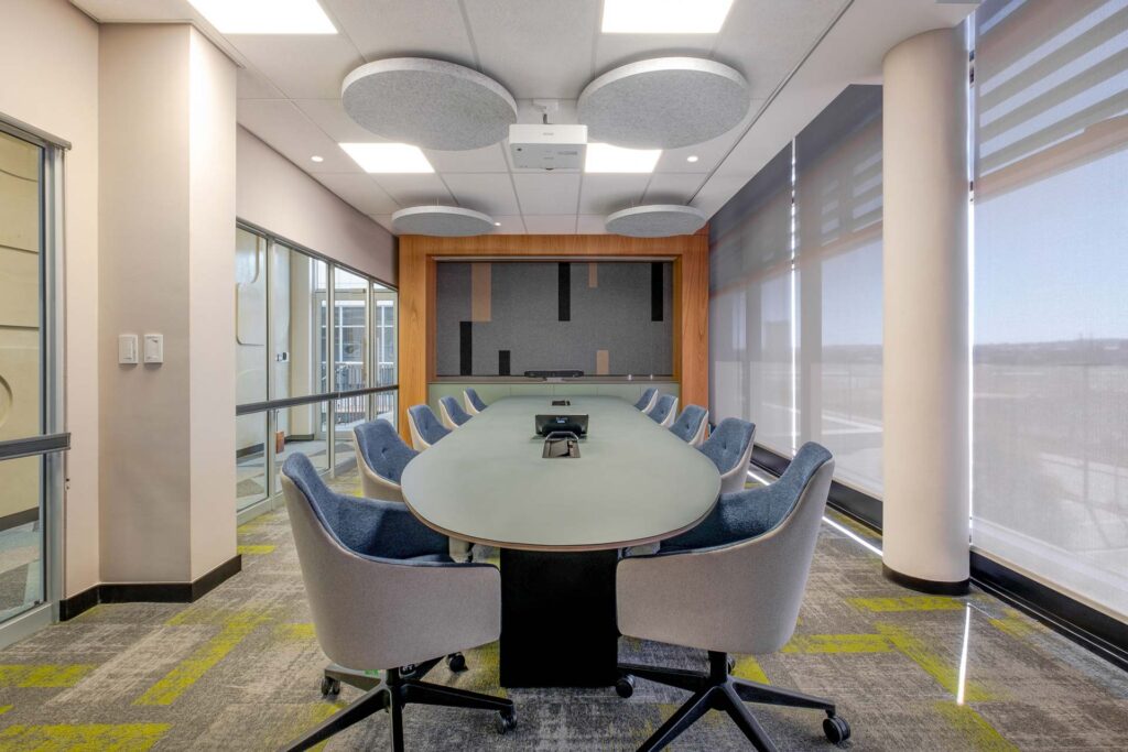 This boardroom features high end furniture, fixtures and equipment