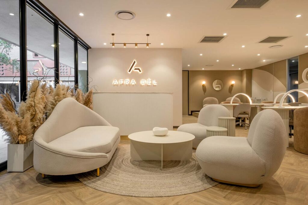This spa features hospitality-inspired furniture in the reception area