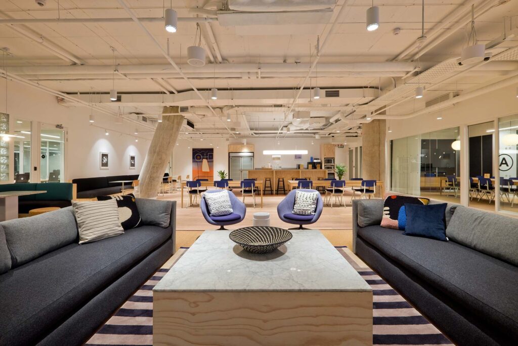 The f f and e specialists for this office arranged soft seating couches and soft seating as well as additional chairs for coworking