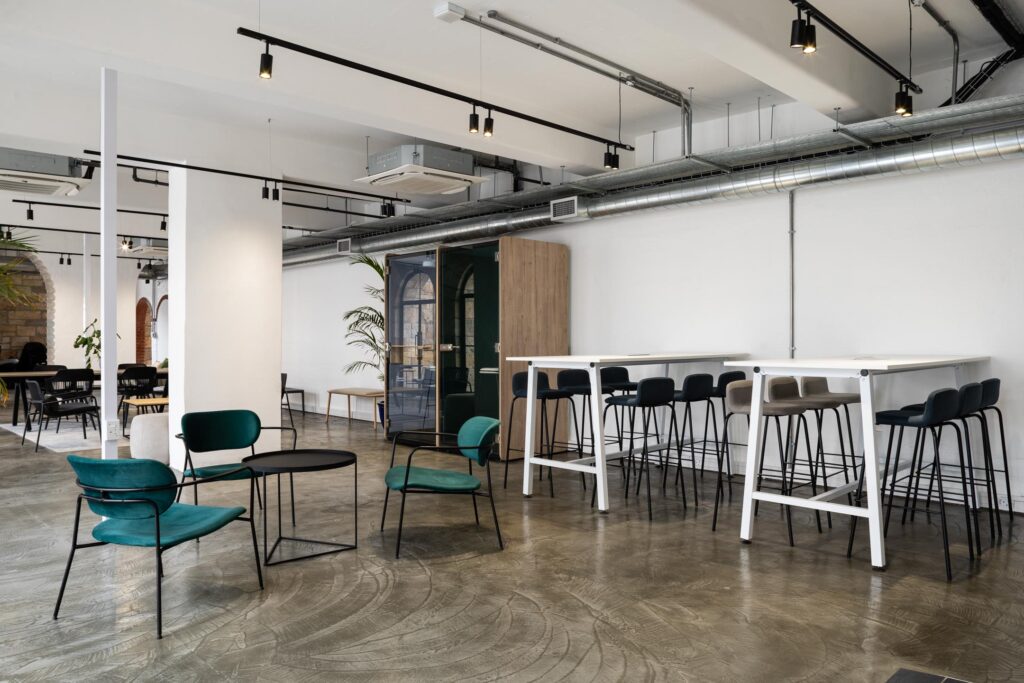 Collaboration area with bar height table stools and lounge seating for commercial f f and e solutions