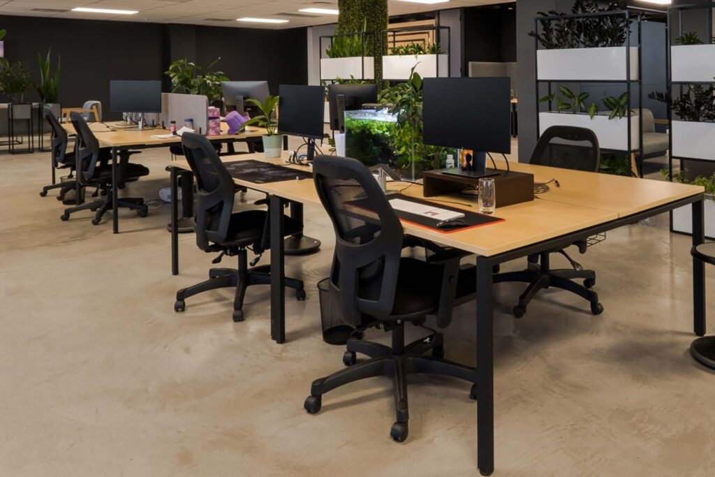 BOB Group corporate office with personalised desks, ergonomic chairs and planters as part of a modern FF&E furniture solution