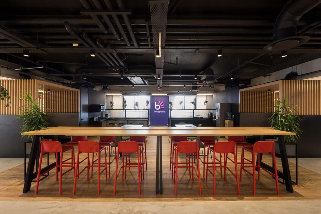 BOB Group office with custom bar stools and flexible canteen furniture designed for collaborative open-plan workspaces