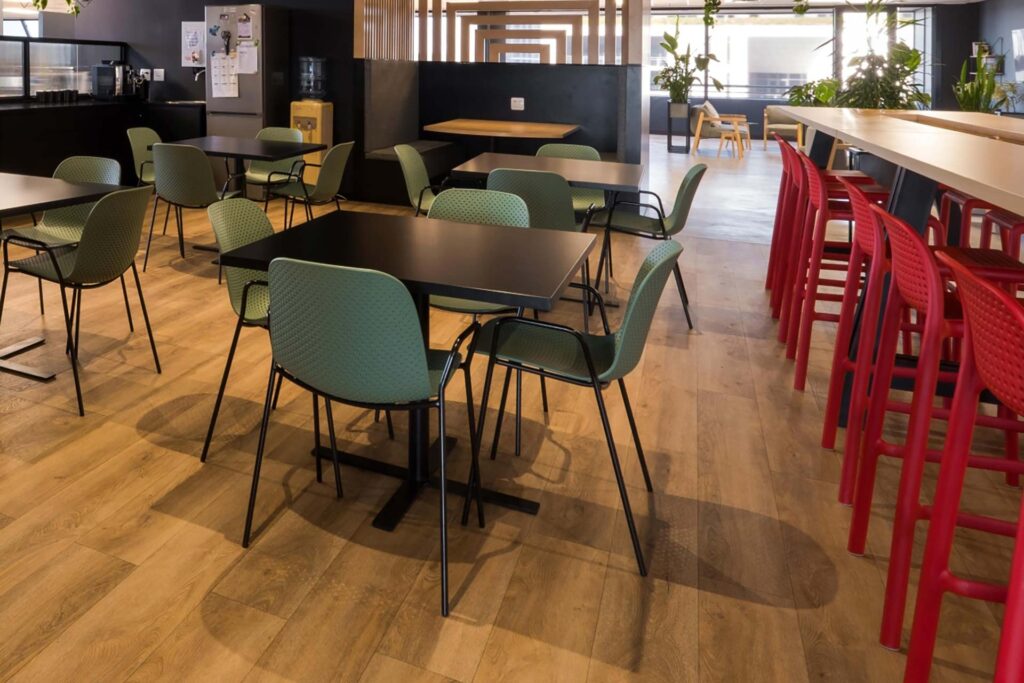 BOB Group Menlyn Maine canteen with commercial tables, chairs, bar stools and booth seating in a variety of durable fabrics as part of an FF&E furniture solution