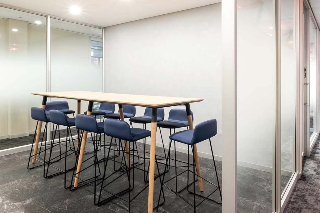 db schenker's offices in Johannesburg's showcasing their furniture sourced by design colab including bar stool high tables for meeting areas