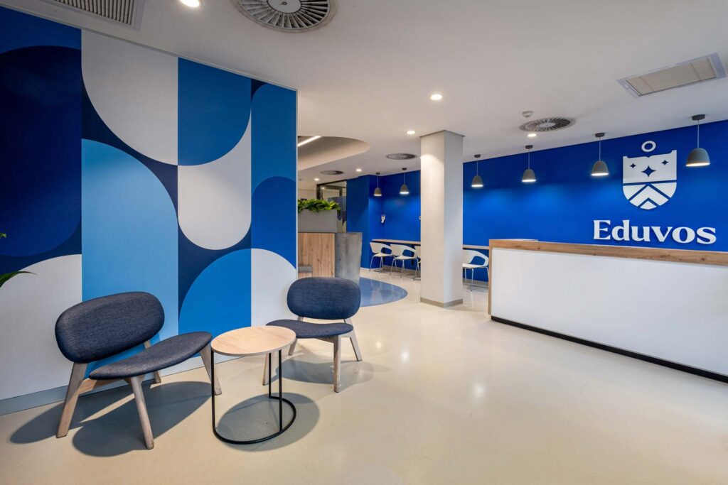 Eduvos Pretoria higher education campus reception with a custom-designed desk and contemporary seating supplied by Design Colab