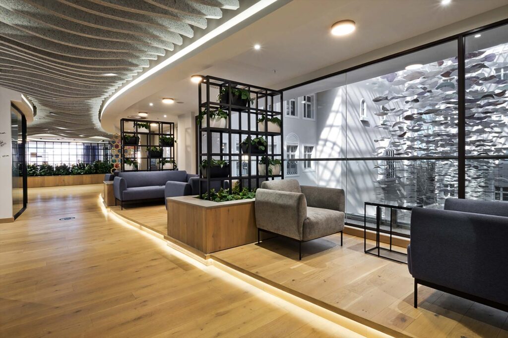 Liberty Sandton office refurbishment featuring high-quality office seating and tables in the reception and open-plan areas