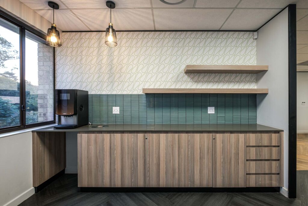 Mix Telematics custom commercial furniture coffee station with bespoke cabinetry as part of a turnkey furniture solution by Design Colab