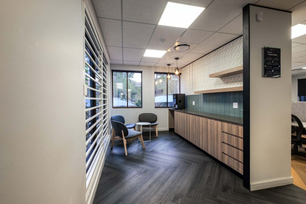 Mix Telematics Midrand canteen area with custom cabinetry and contemporary seating as part of an FF&E solution