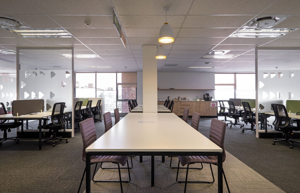 PayJoy Johannesburg open-plan workspace with flexible collaborative office furniture, ergonomic desks and chairs, and practical storage solutions