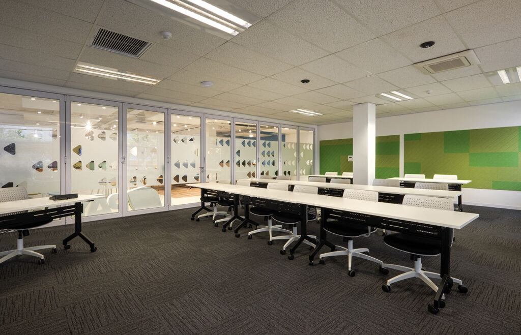 PayJoy Johannesburg corporate training area with modern white desks, office chairs and contemporary commercial furniture