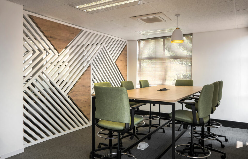 PayJoy Johannesburg office meeting area with contemporary commercial furniture and bar stools