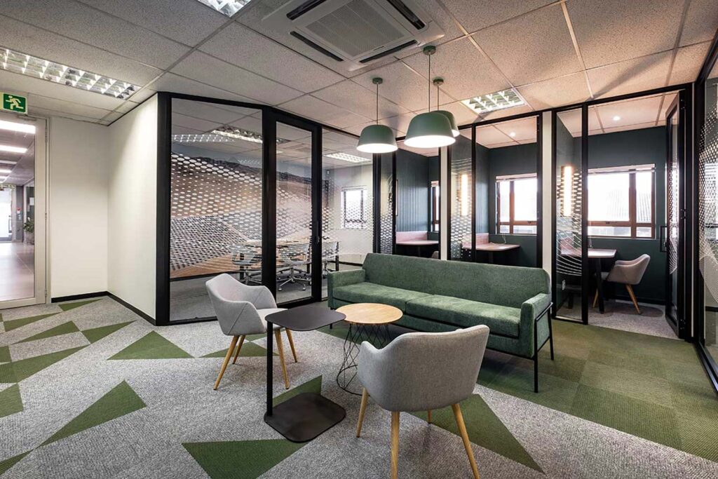 Sturdee Energy Johannesburg office with corporate furniture, soft reception seating and private acoustic call booths