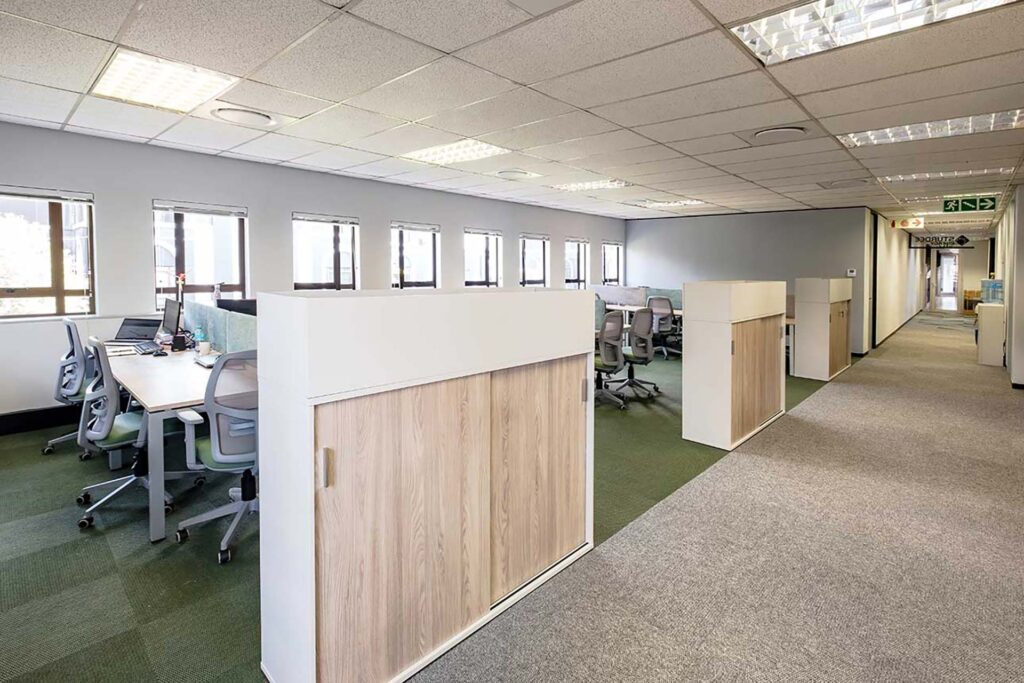 Sturdee Energy open-plan workspace with ergonomic office chairs, corporate desks, storage lockers and contemporary workplace furniture solutions