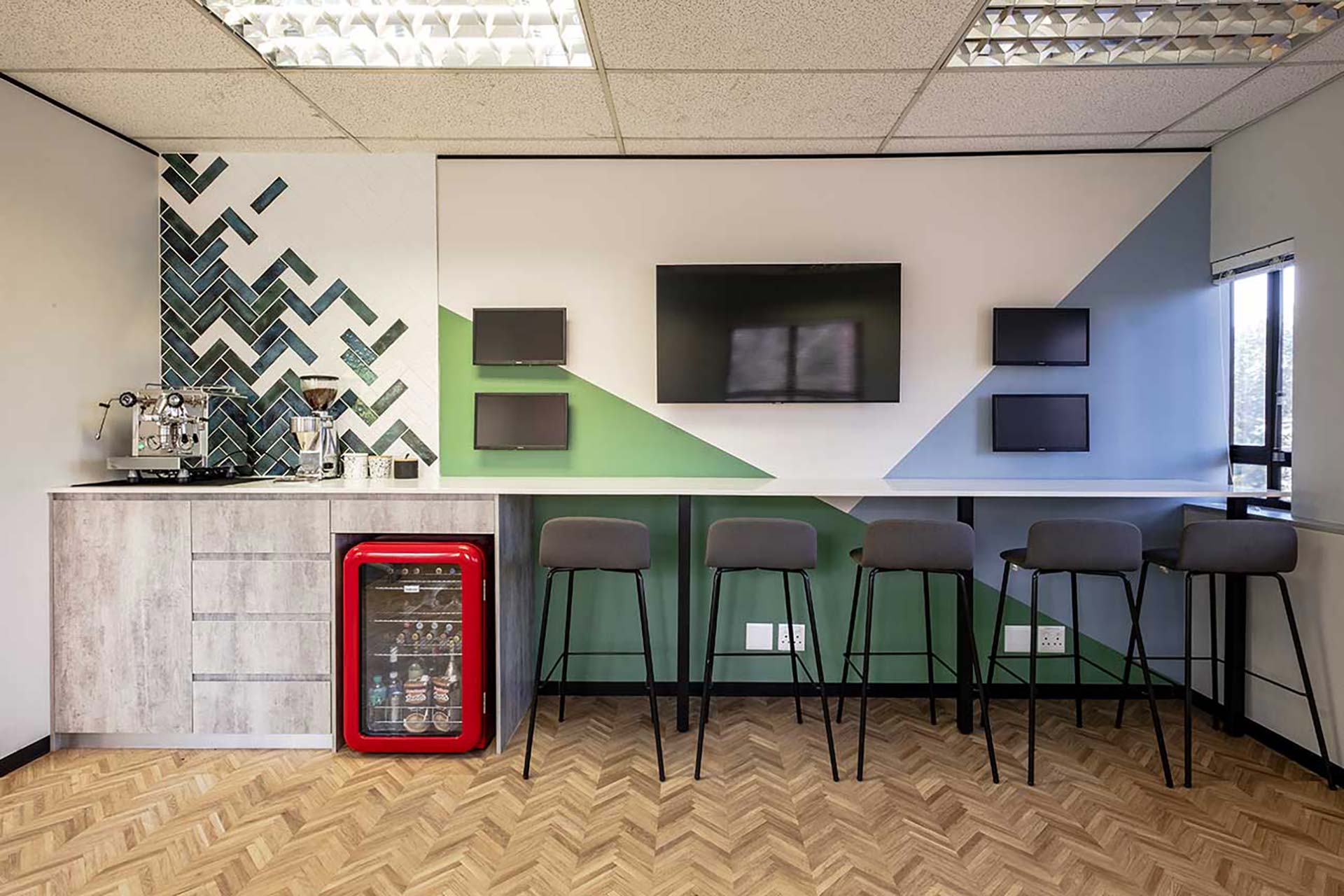 Sturdee Energy South Africa office staff canteen with commercial furniture, bar stools, custom finishes, storage solutions and kitchen seating