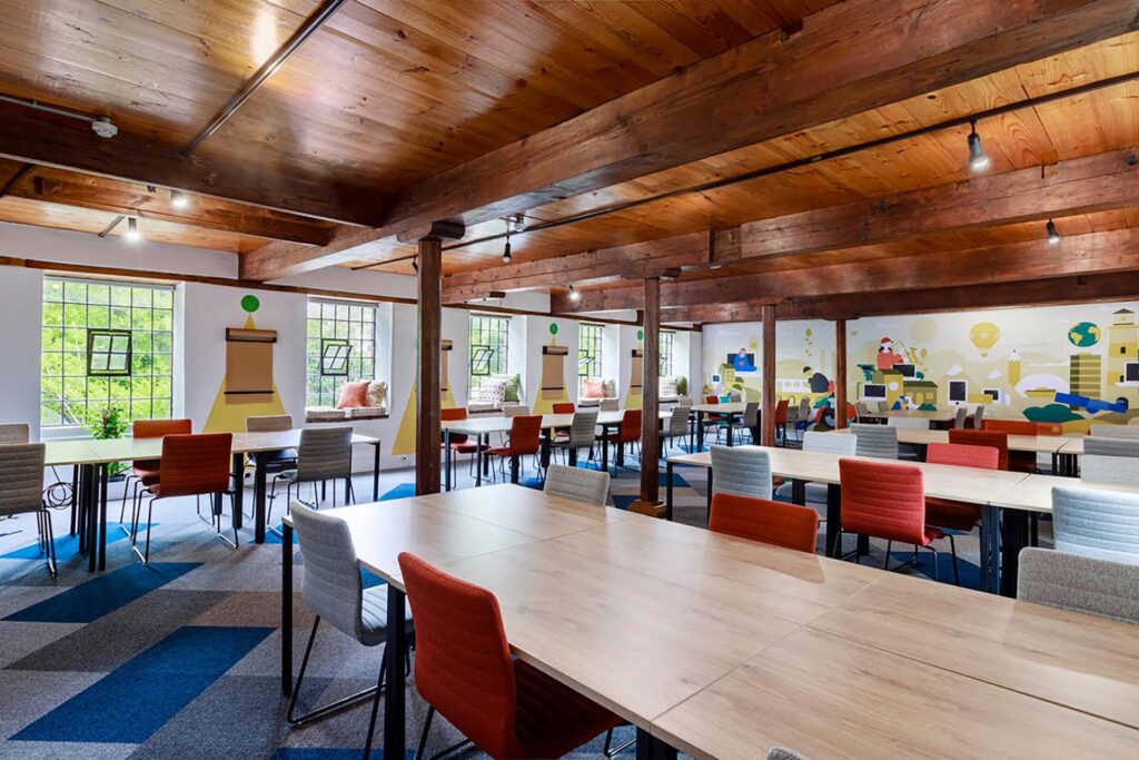 Valenture Cape Town college with student desks, tables and custom décor supplied through Design Colab’s FF&E procurement services in South Africa