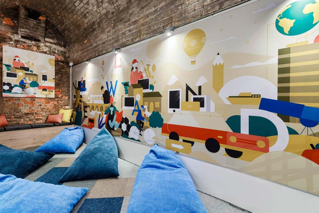 Valenture South Africa campus student chill area with bean bags, custom fabric flooring and contemporary décor supplied by Design Colab