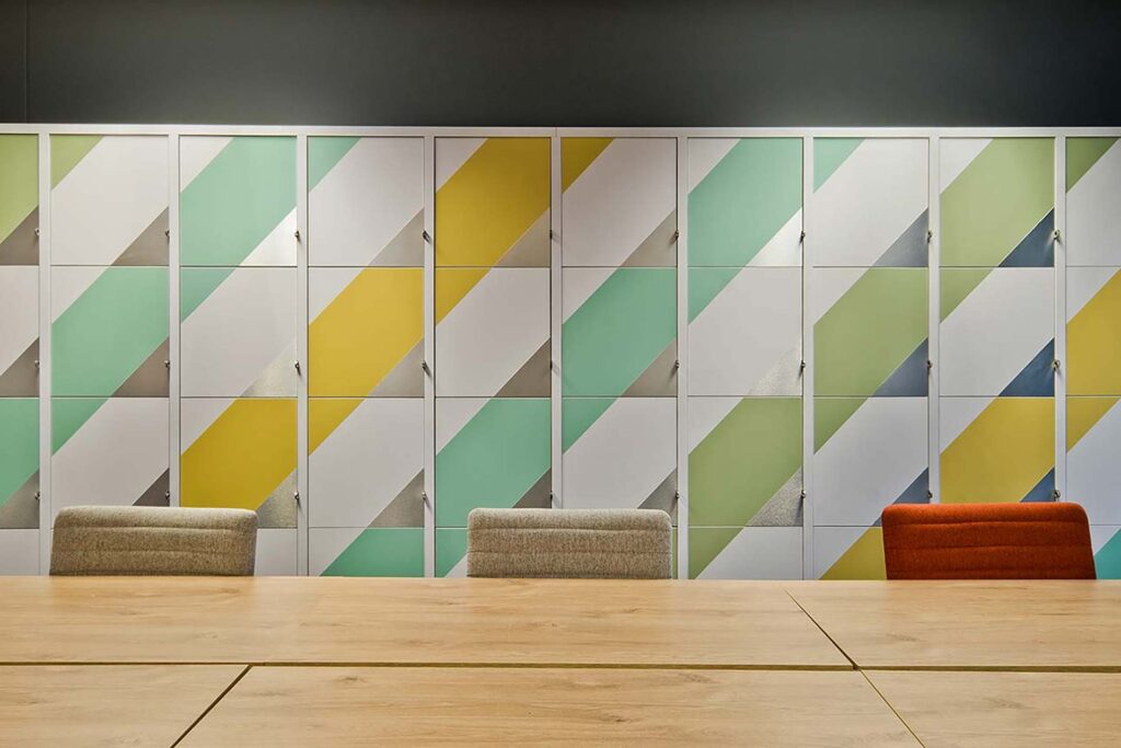 Valenture educational campus with colourful student lockers, chairs and desks designed for collaborative learning spaces